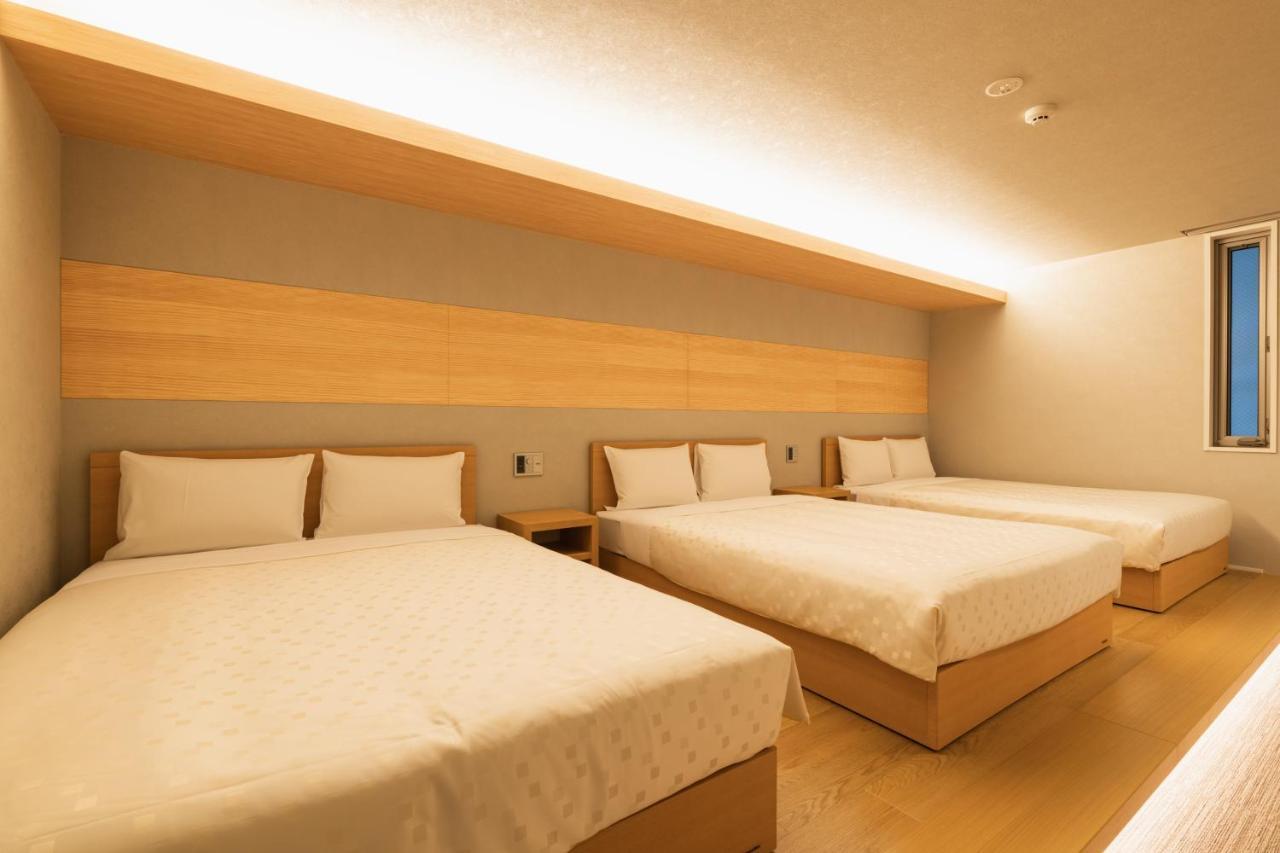 Grand Base Hakata Station Aparthotel Фукуока Екстериор снимка